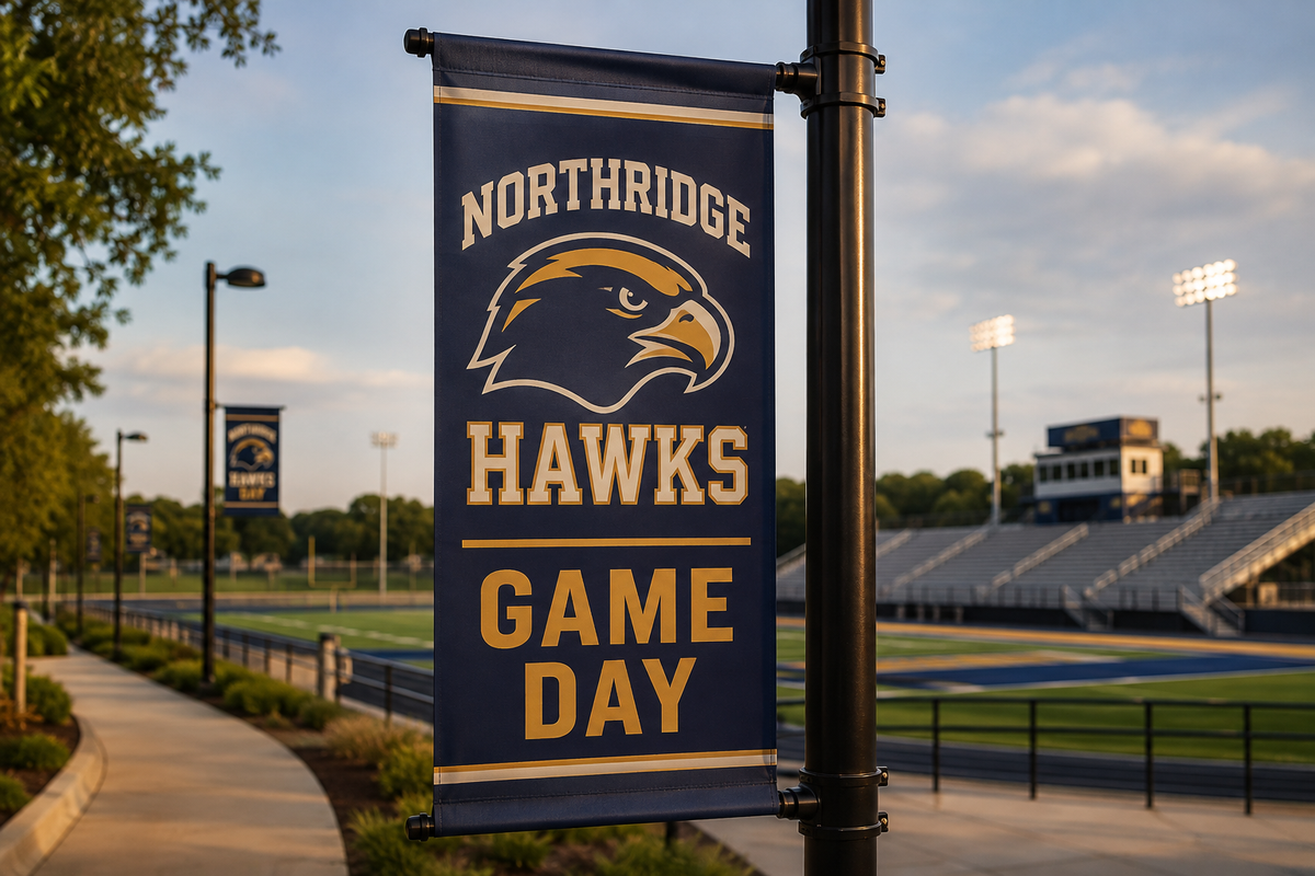 Custom sports venue pole banner with team branding
