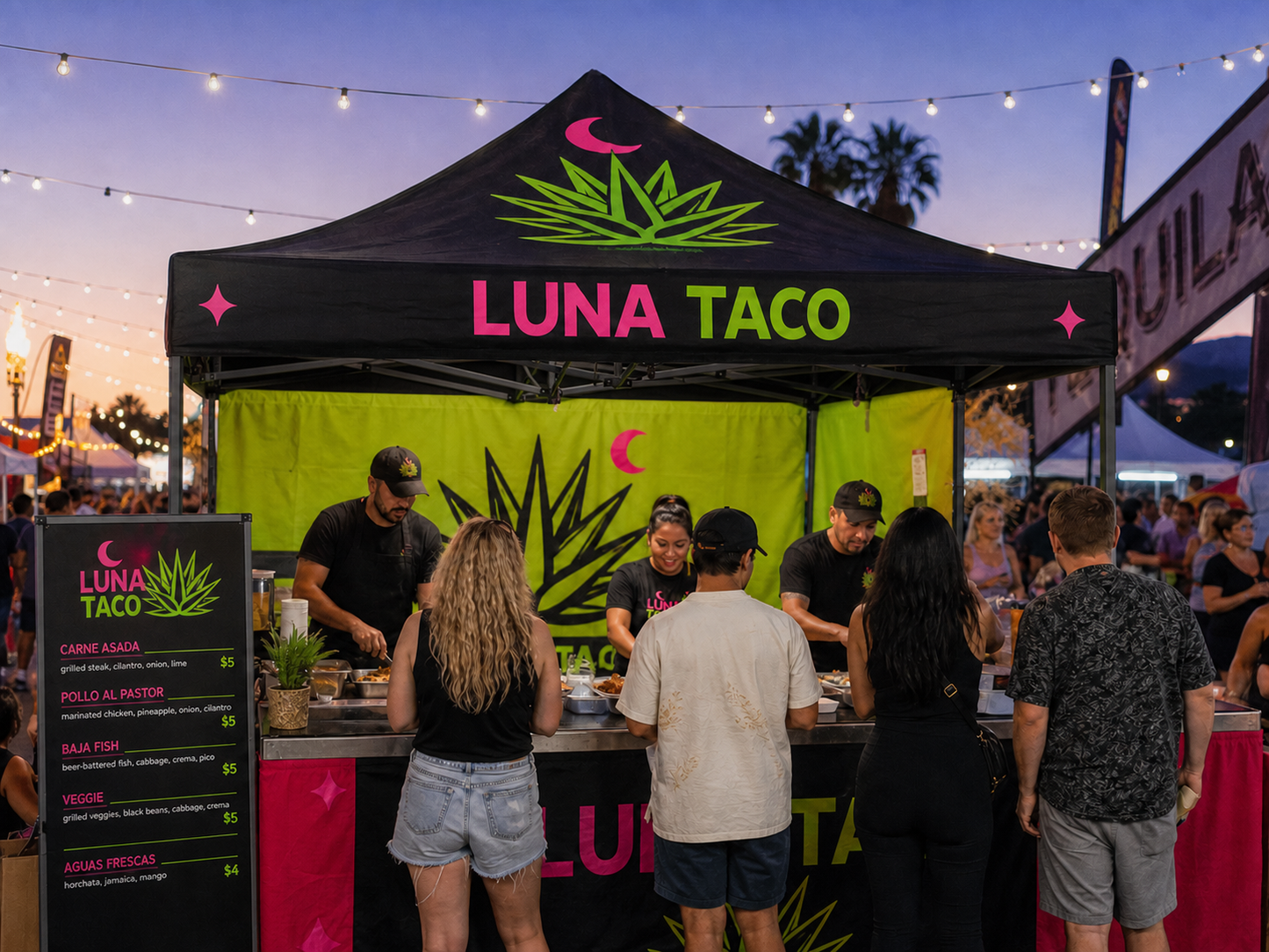Custom 10x10 food vendor tent at an evening festival